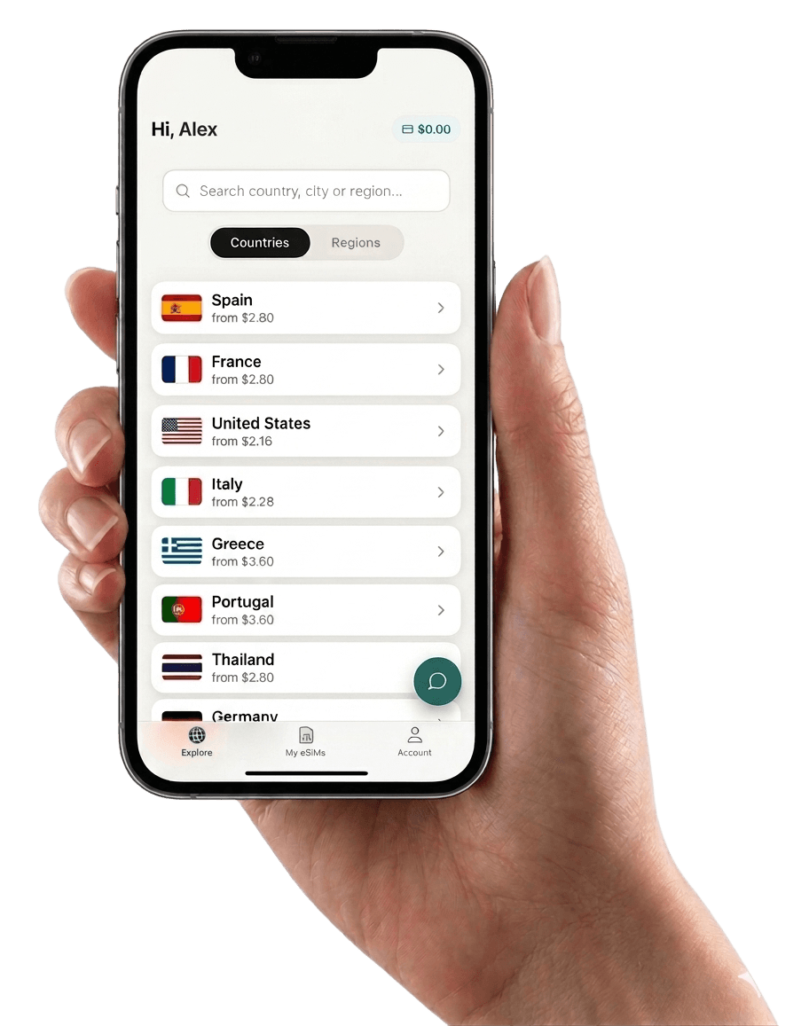 Hand holding a phone showing the Vyroam app